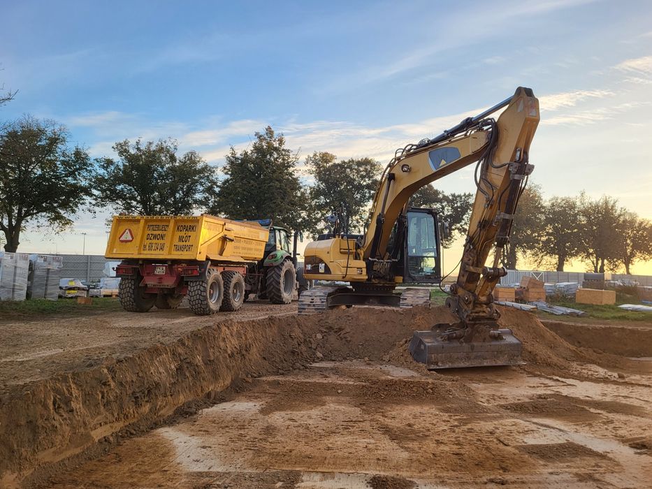 Wykopy pod fundamenty prace ziemne zasypka piaskiem