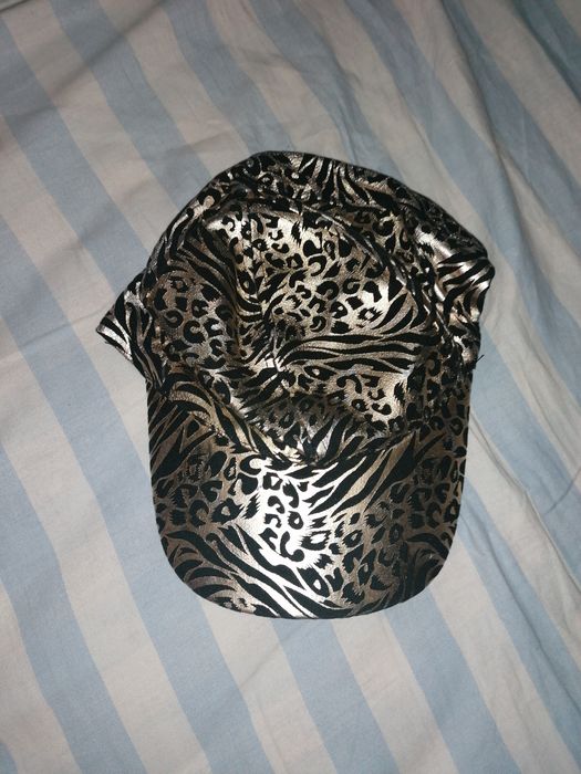 Chapéus novos lantejoulas e estampado tigresa