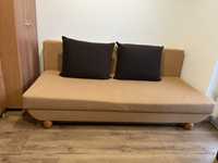 Rokladana sofa z poduszkami