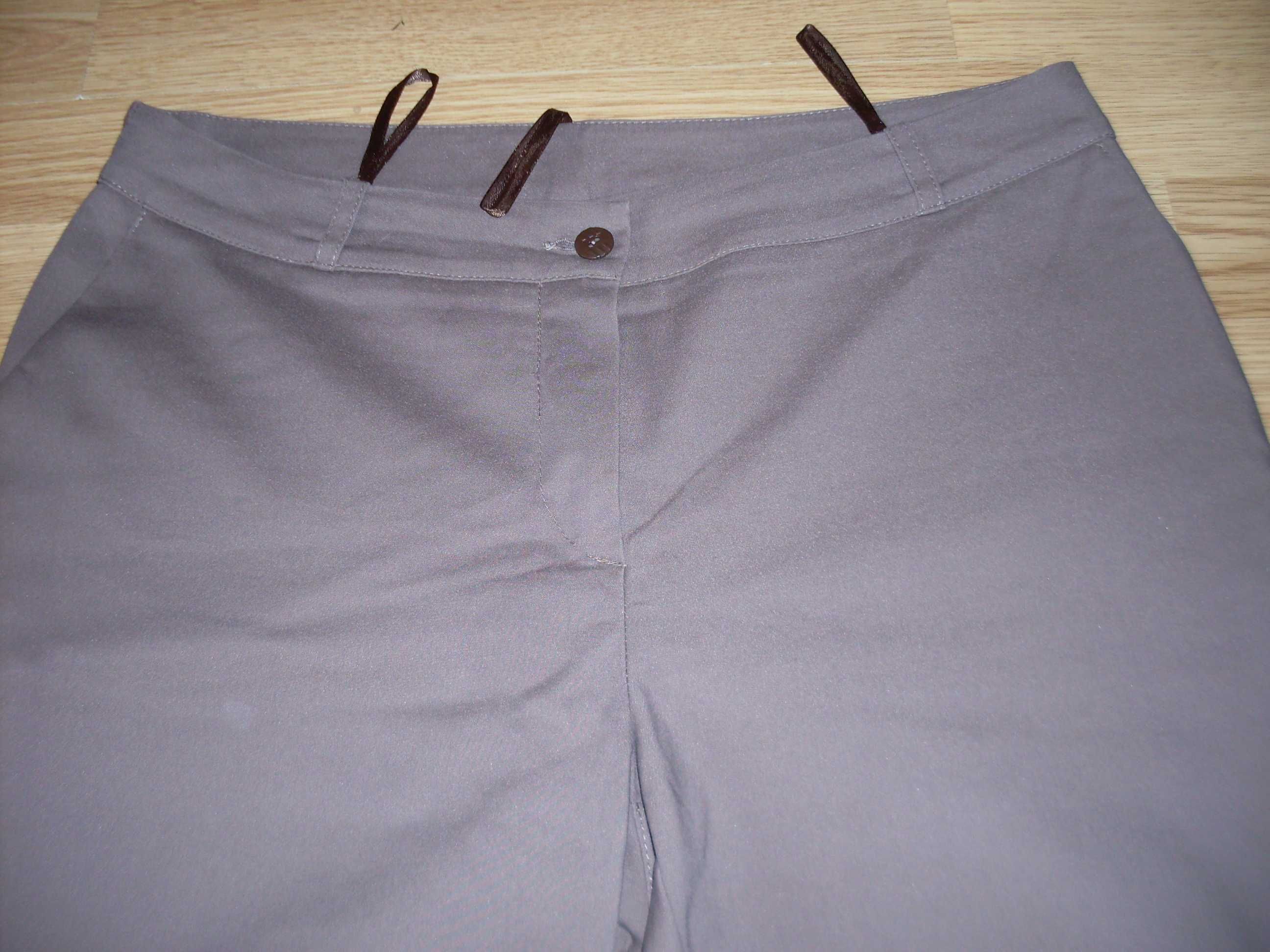 spodnie rurki beżowe 40 wąskie