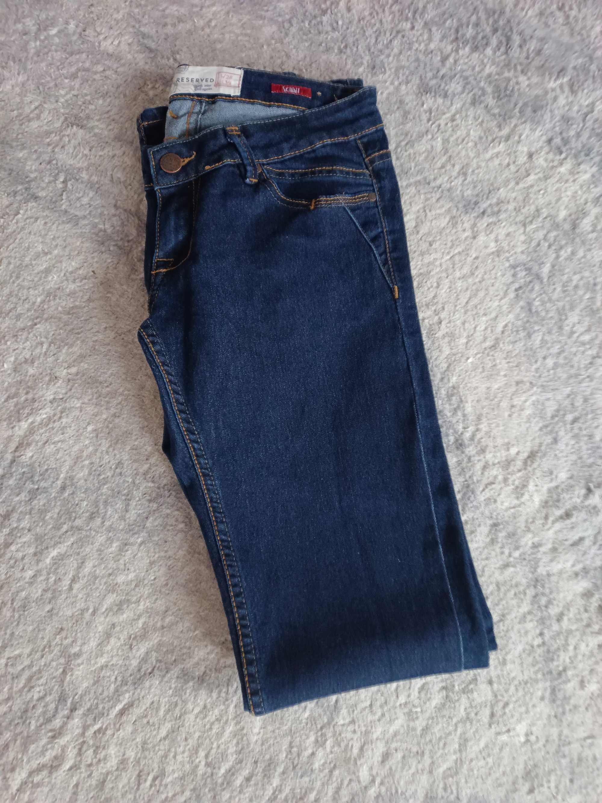 Jeansy Reserved skinny 28/34 granatowe,jak nowe,dopasowują się do figu