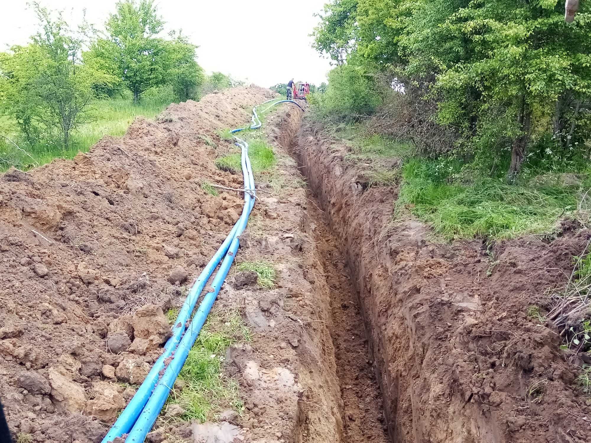 Usługi koparko-ładowarką kompletne prace i koparką linową stawy rowy.