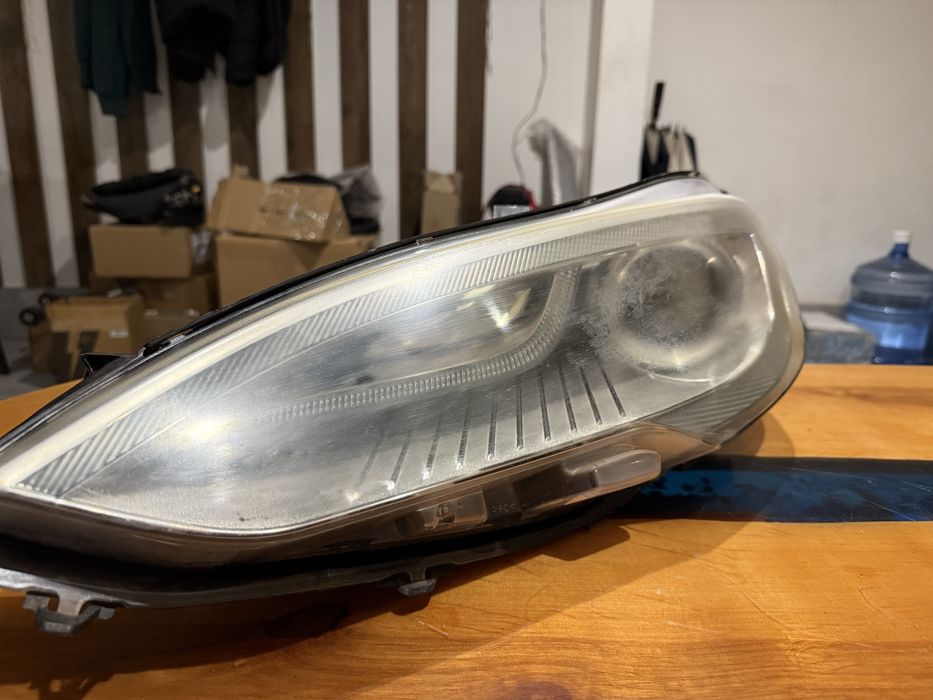 Фара ліва передня модел с 14 рік