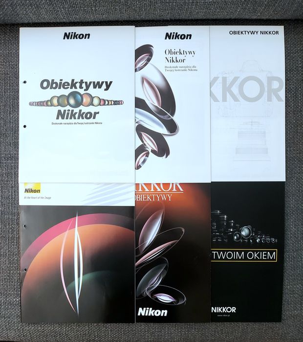 Nikon obiektywy Nikkor zestaw 6 folderów