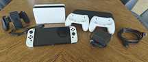 Nintendo Switch OLED + etui + gripi