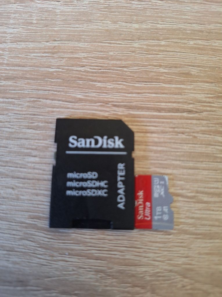 Karta pamięci SD 1 tb Sandisk dwie sztuki z adapterem i inną karta.