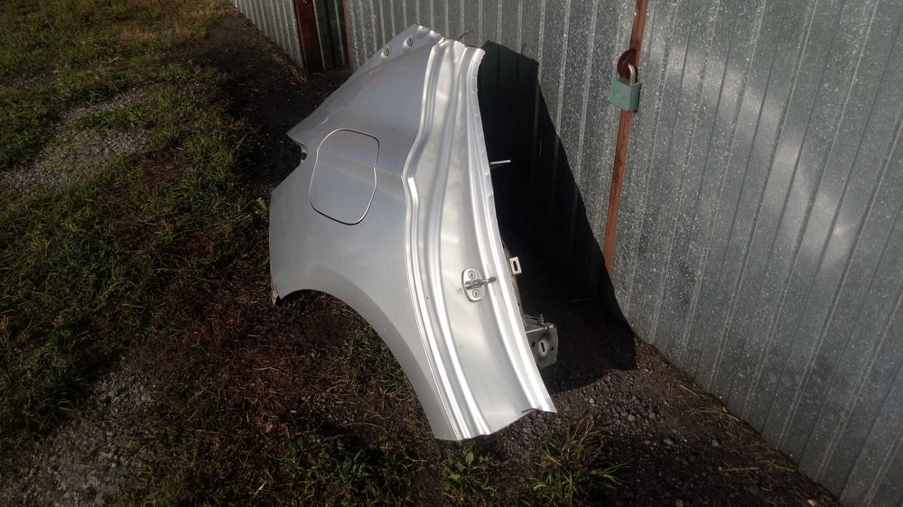 Opel Astra K V Błotnik tył tylny srebrny Z176 HB 5-drzwi