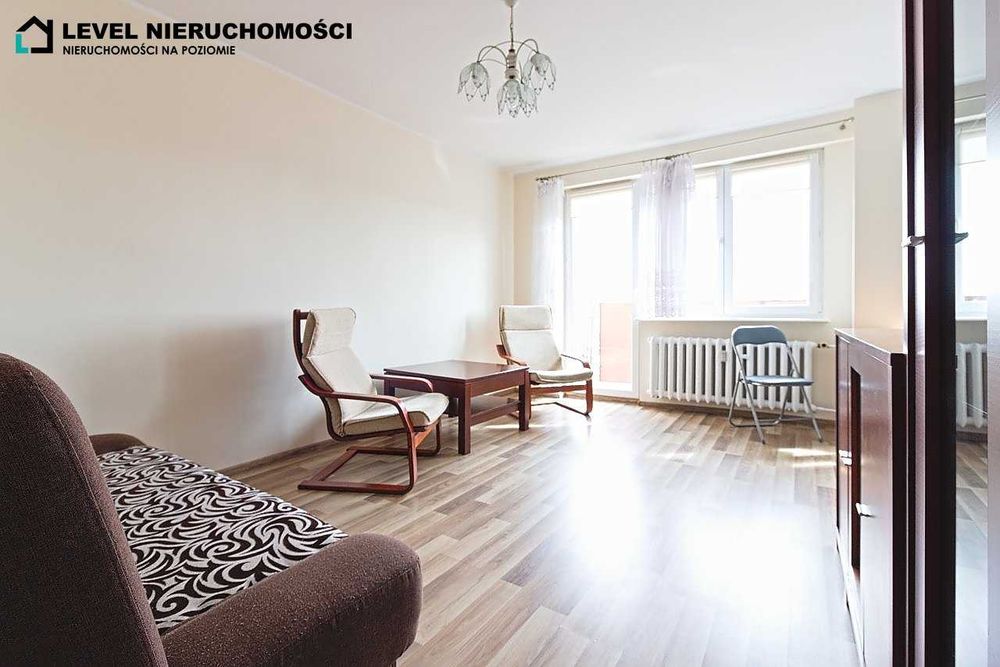 Kawalerka z balkonem w centrum.