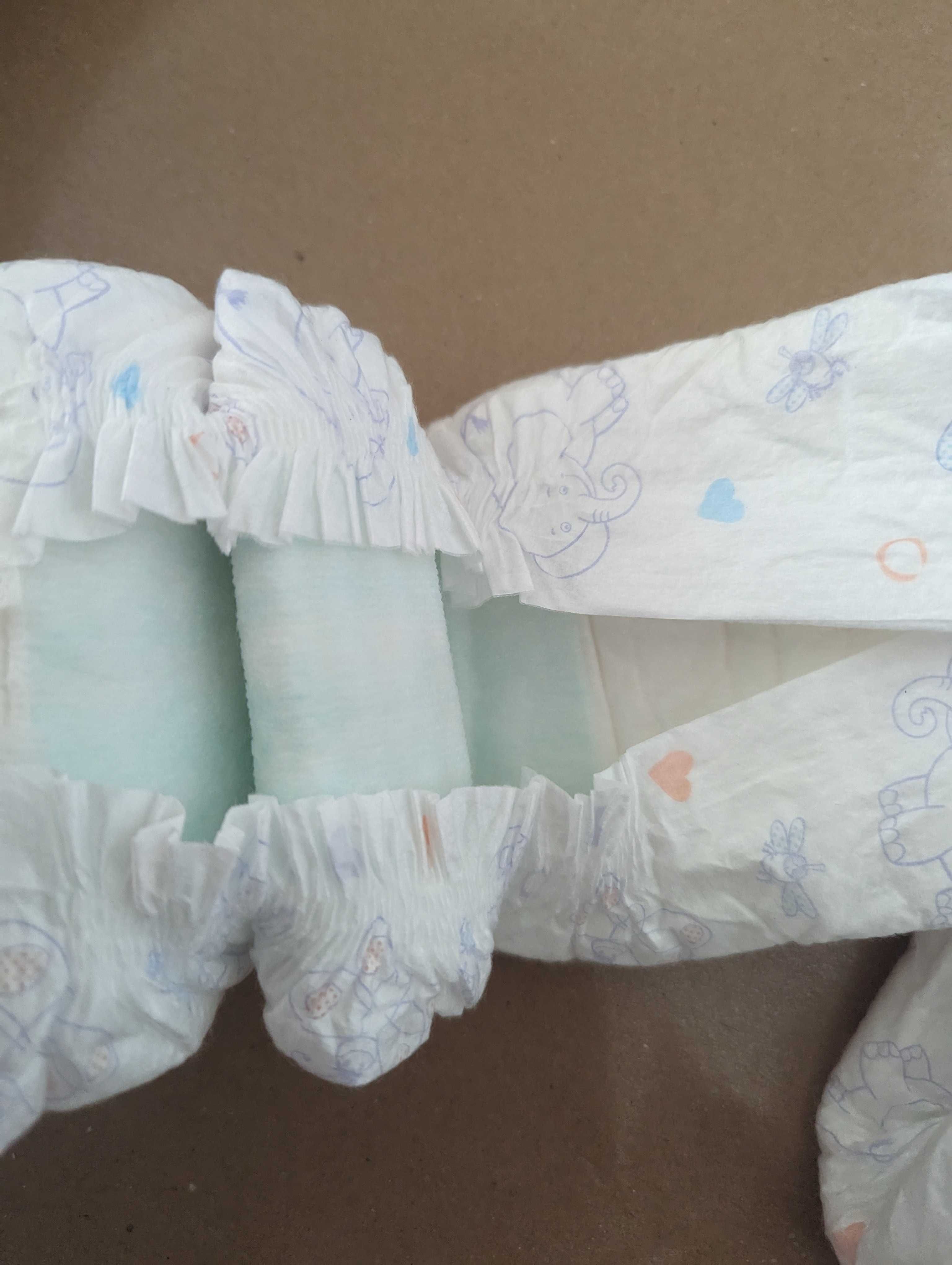 32 sztuki pieluszek dla dzieci Pampers 5,Dada 5, Kupili 5