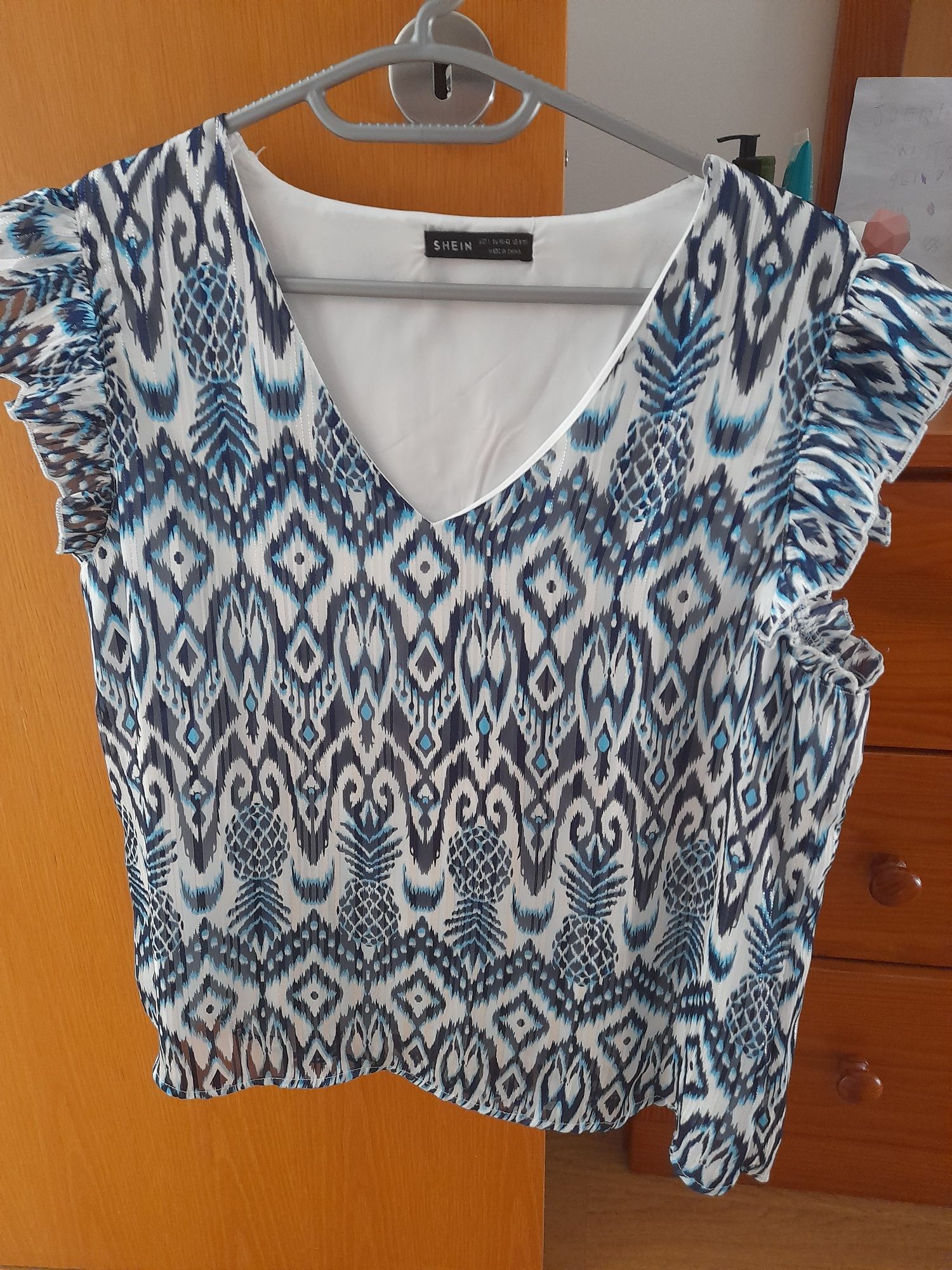 Conj. Calças e blusa