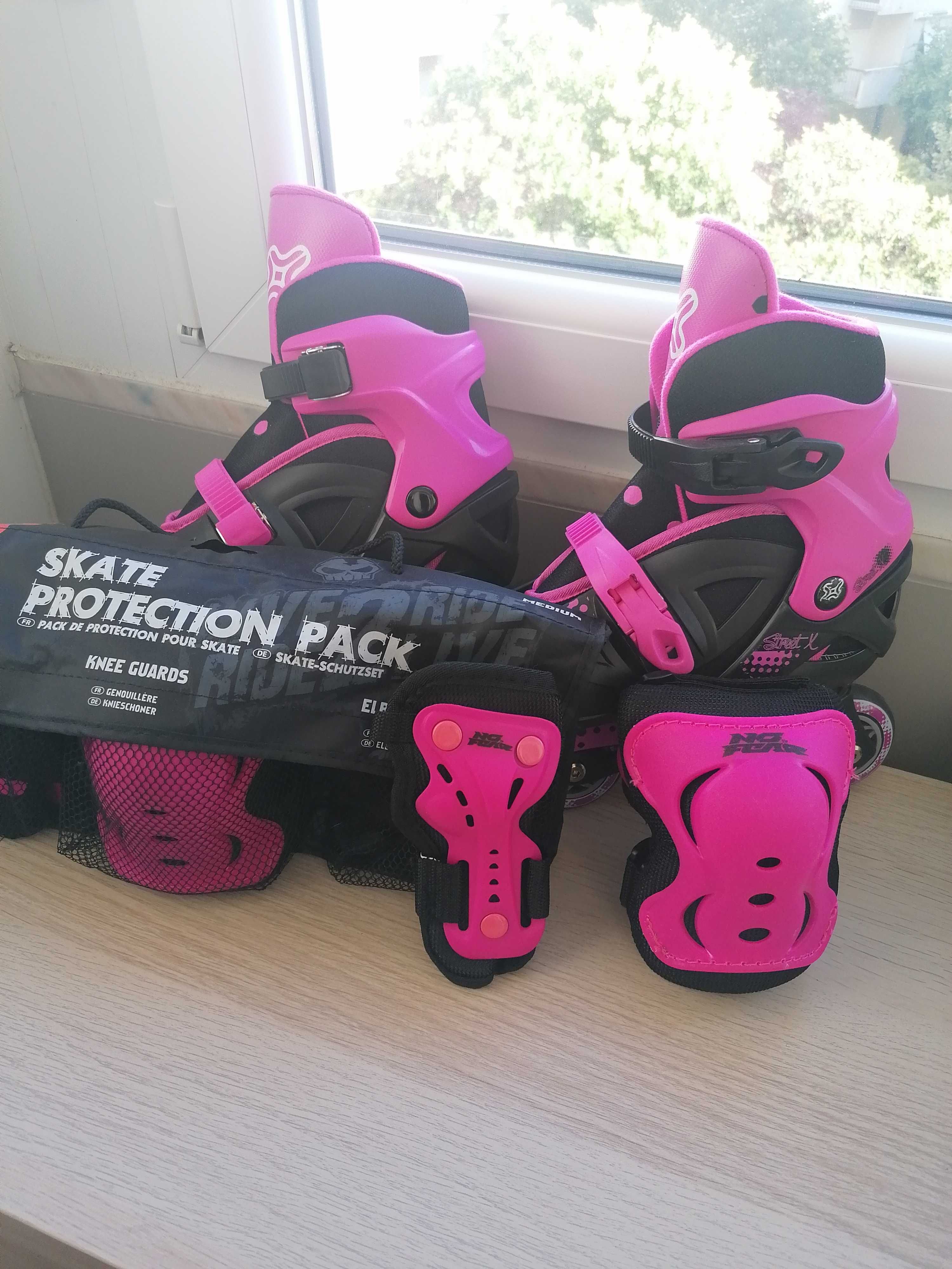 Patins em linha rosa e preto