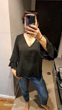 Czarna elegancka bluzeczka z falbankami na rękawach