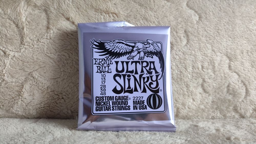 Ernie Ball Ultra Slinky (7 kompletów)
