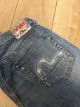 джинсы EVISU торг