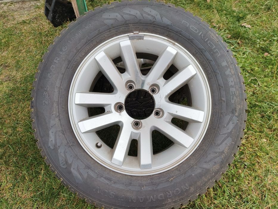 Гума Nokian 235 60 r16 шипована на оригінальних дисках