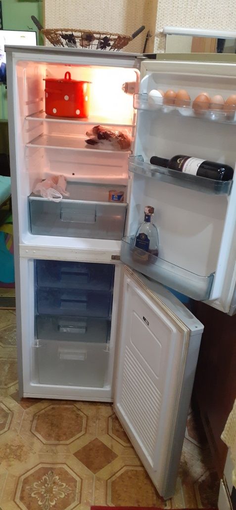Німецький вузький холодильник Amigo