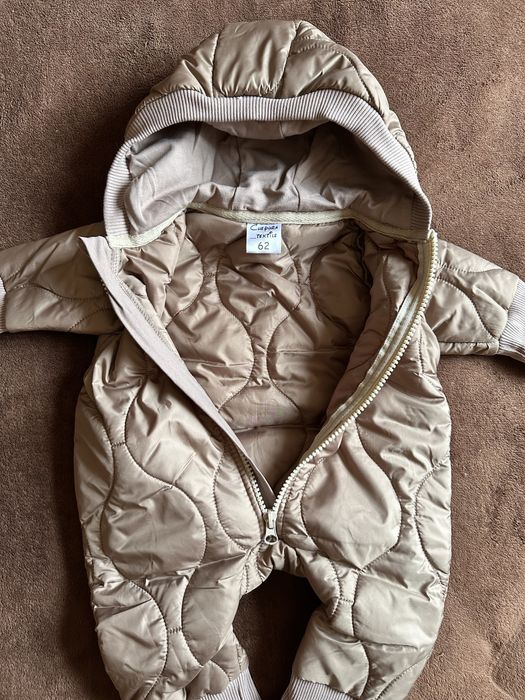 Продам новый комбез на осень