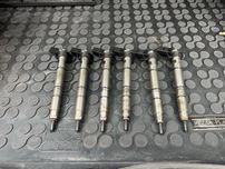 Wtryskiwacze Audi A8 D4 3.0TDI CDTA  komplet