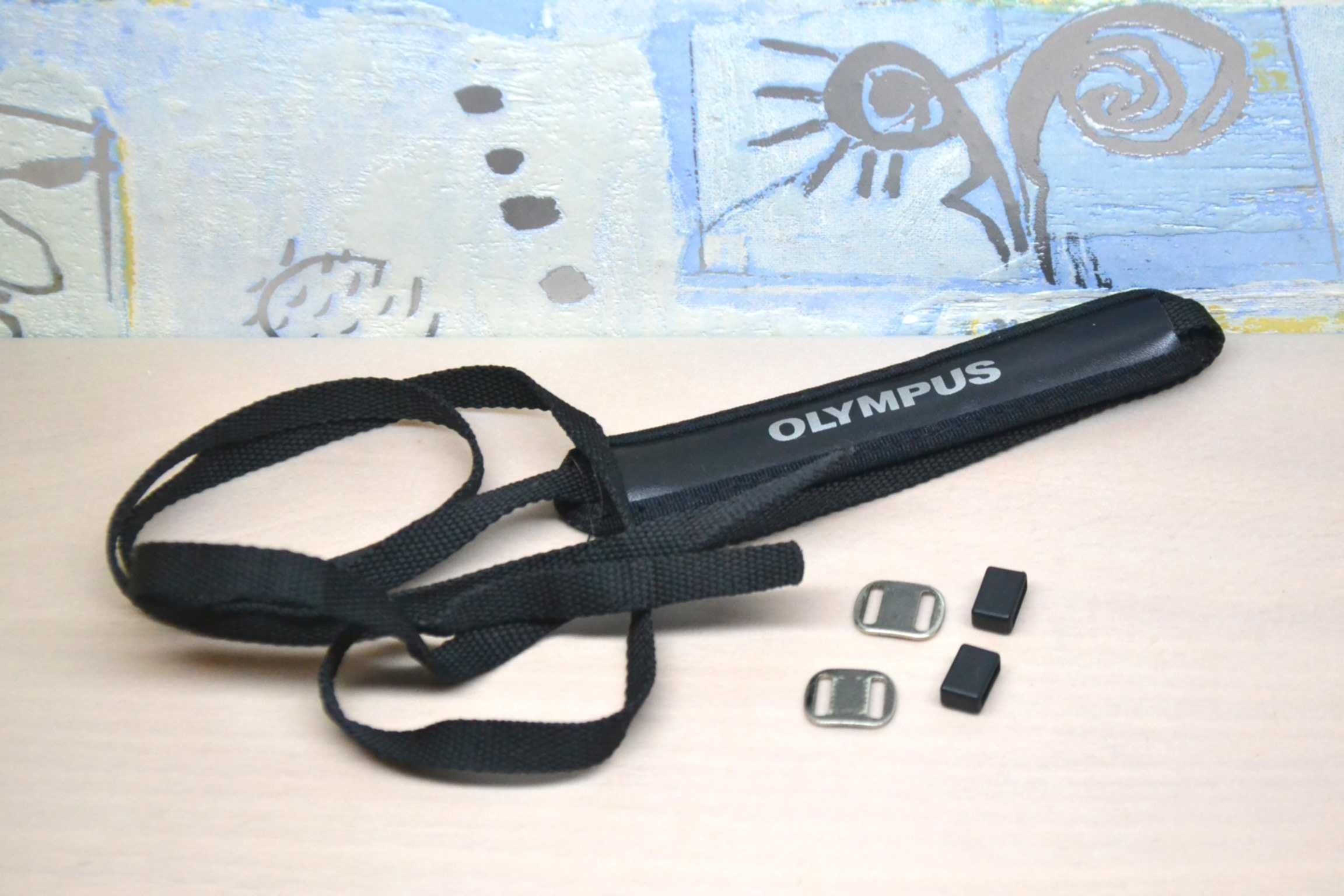 oryginalny pasek OLYMPUS do aparatu lustrzanki uni oryginał ładny