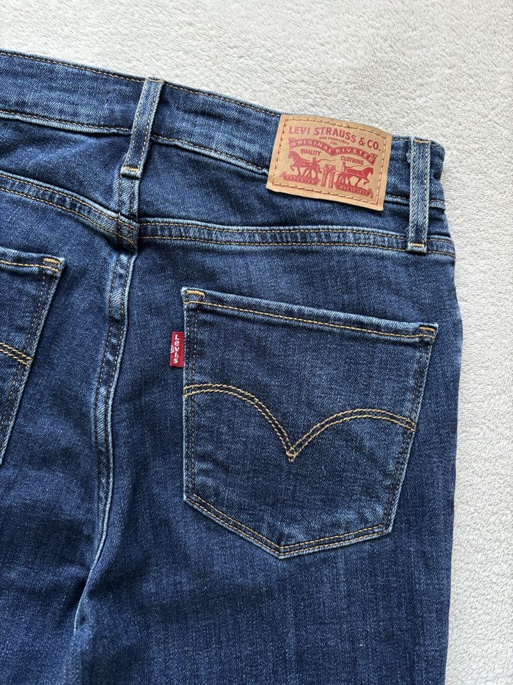 Granatowe spodnie z wysokim stanem 721 High Rise Skinny W26 L32 Levi’s