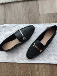 Sapatos rasos pretos
