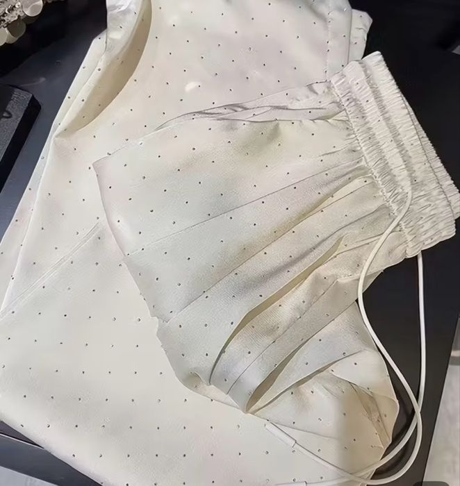 Штани белые со стразами