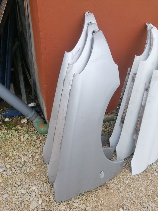 Guarda lamas peugeot 206