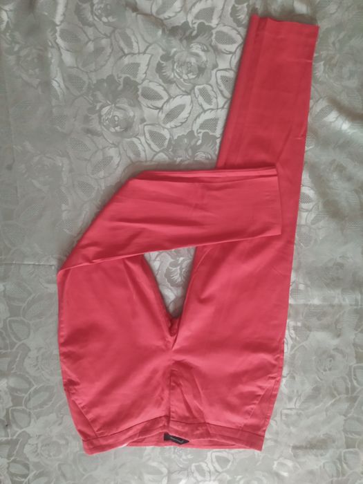 Spodnie damskie z kieszeniami r 38 koralowe