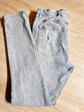 Spodnie dla chłopca H&M 158cm 12-13 lat z dziurami  jasnoniebieskie