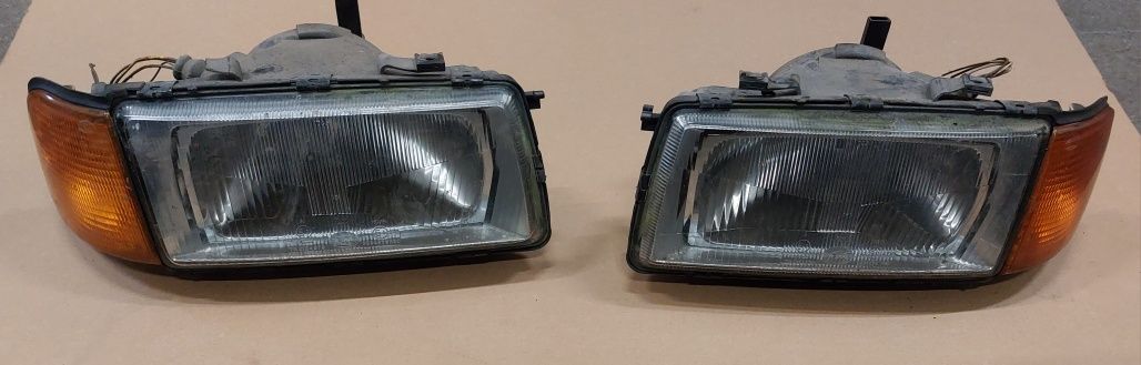 Lampa Maska Audi 80 hak klapa zegary zacisk gril koła