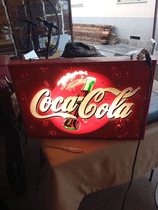 Vendo reclame da coca cola