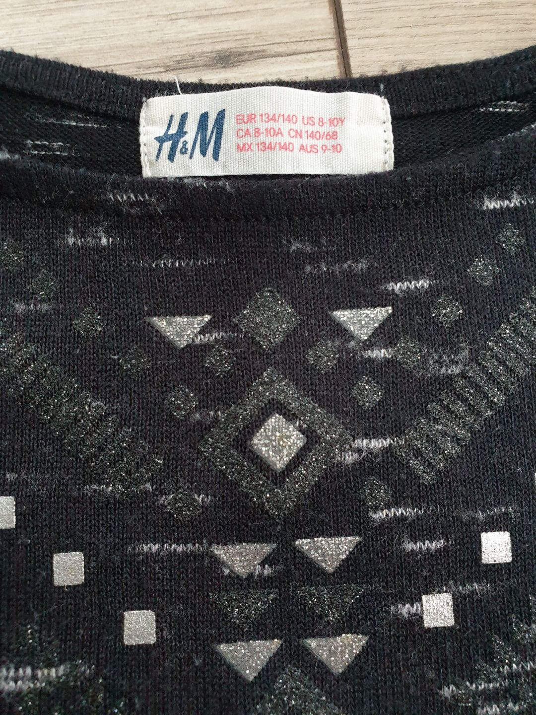 Czarna bluzeczka z aplikacją H&M r 134/140