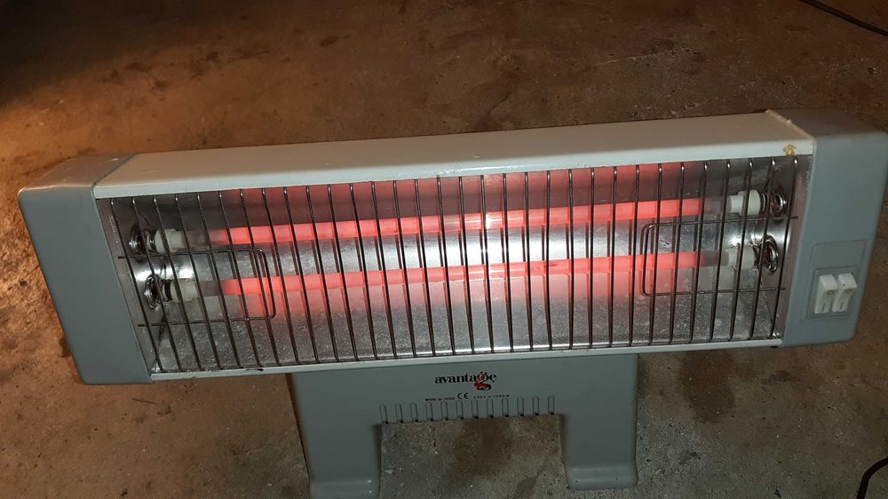 Aquecedor de barras antigo, mas a funcionar bem