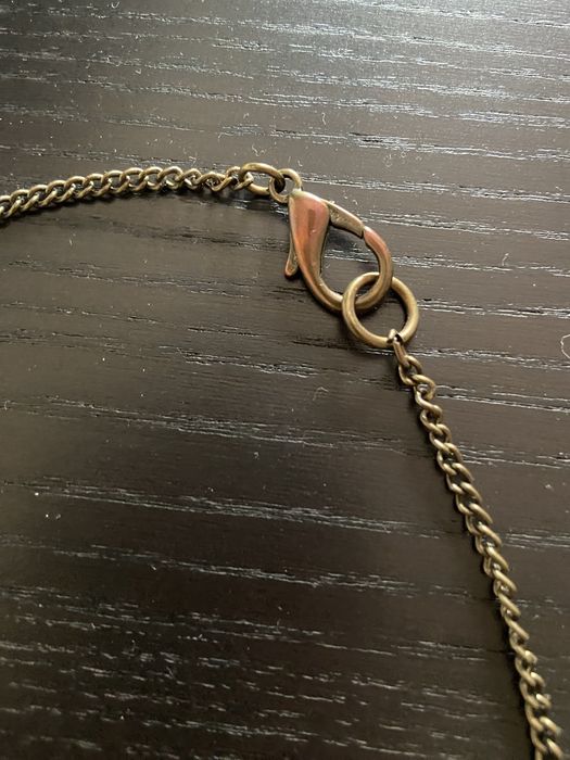 Colar comprido dourado e preto