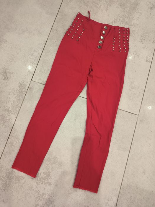 Czerwone spodnie damskie z dzettami