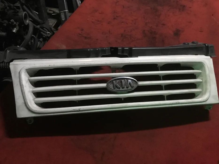 Grelha kia sportage com simbolo