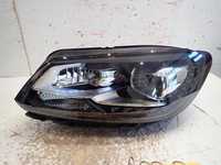 Lampa przód przednia lewa VW TOURAN 2010- BI-XENON SKR