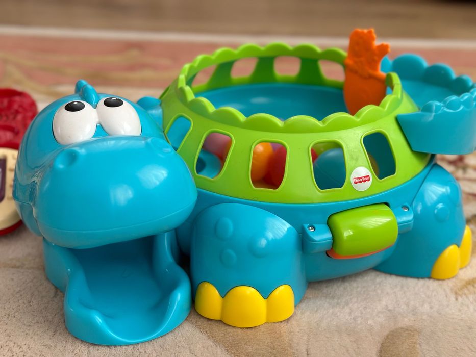 Музыкальный динозавр "Веселые шарики", Fisher-Price