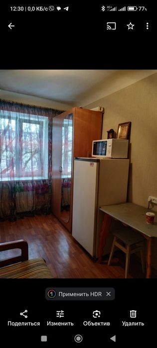 Комнату в доме гостиного типа