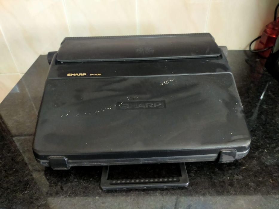 Máquina de escrever elétrica Sharp