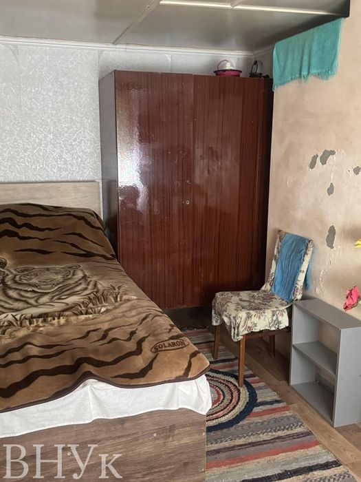 Земельна ділянка в межах Луцька з будинком!