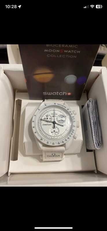 Omega Swatch Snoopy SO33W700 Retro Futuryzm z Fazą