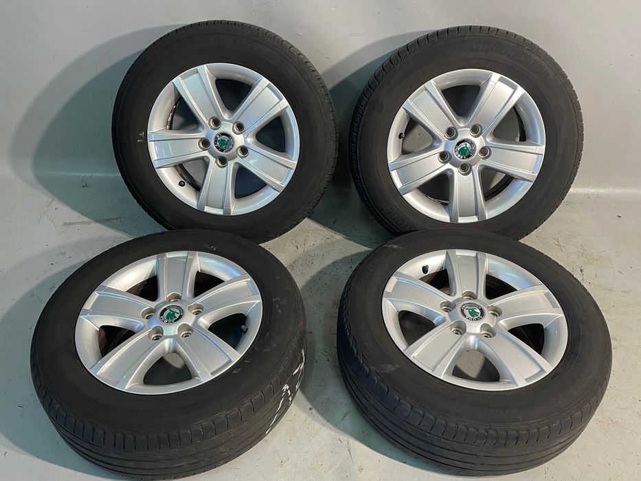 koła aluminiowe skoda plus opony 195 / 65 R15 5x112 oryginał