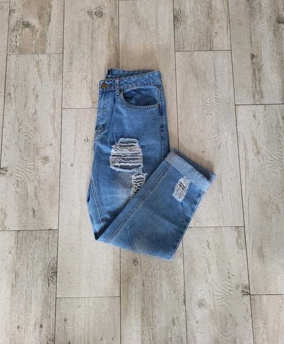 Spodnie z wysokim stanem spodnie z przetarciami 38