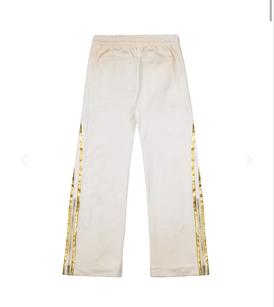 Racer worldwide track pants beige and gold