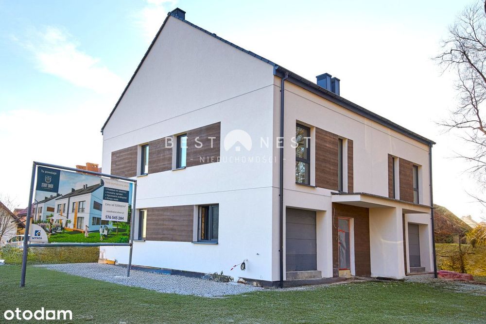 Nowoczesny dom w otoczeniu zieleni