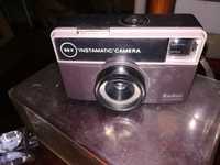 Máquinas fotográficas antigas Kodak e Canon