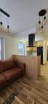 Apartament dwupoziomowy z ogródkiem