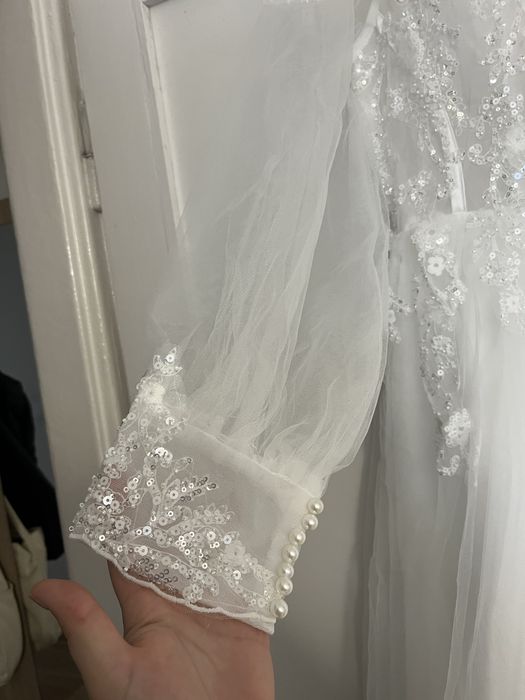 Suknia ślubna długi rękaw