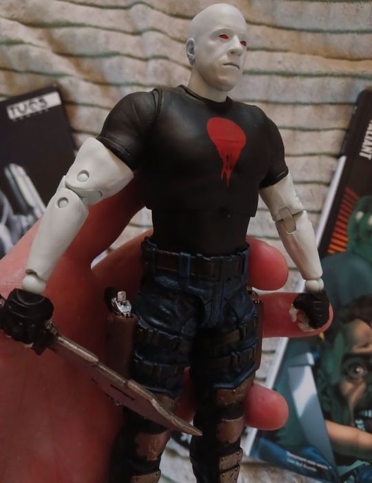 Фігурка McFarlane і дві книги